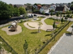 Spielplatz mit Grünfläche - Schöne 3 Zimmer Wohnung im EG mit Terrasse, An der Pferdekoppel 2