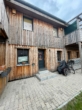 Holzhaus mit Terrasse - Historischer 4-Seitenhof mit Entwicklungspotenzial in Britz – ruhige Lage, vielseitig nutzbar