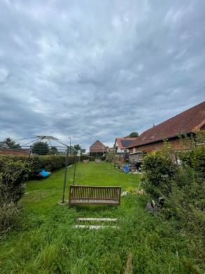Dreifamilienhaus mit großem Garten, Carport & vielseitigem Nutzungspotenzial - Garten Hofhaus (7210)