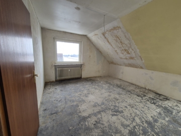 Charmante Dachgeschosswohnung in Seelze zu vermieten - Schlafzimmer 1 (5068)